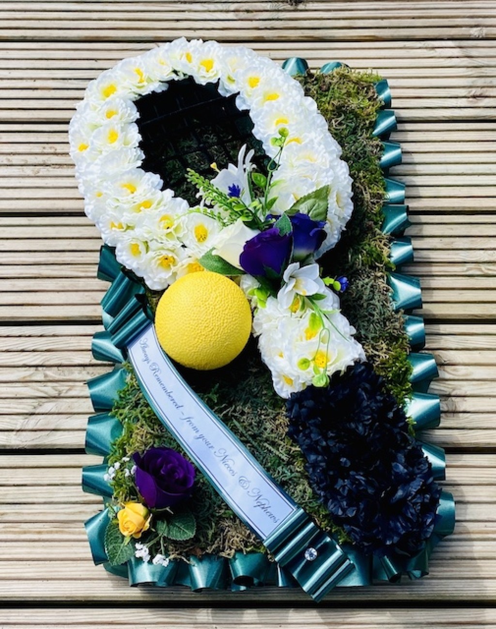 Tennis themed funeral tribute