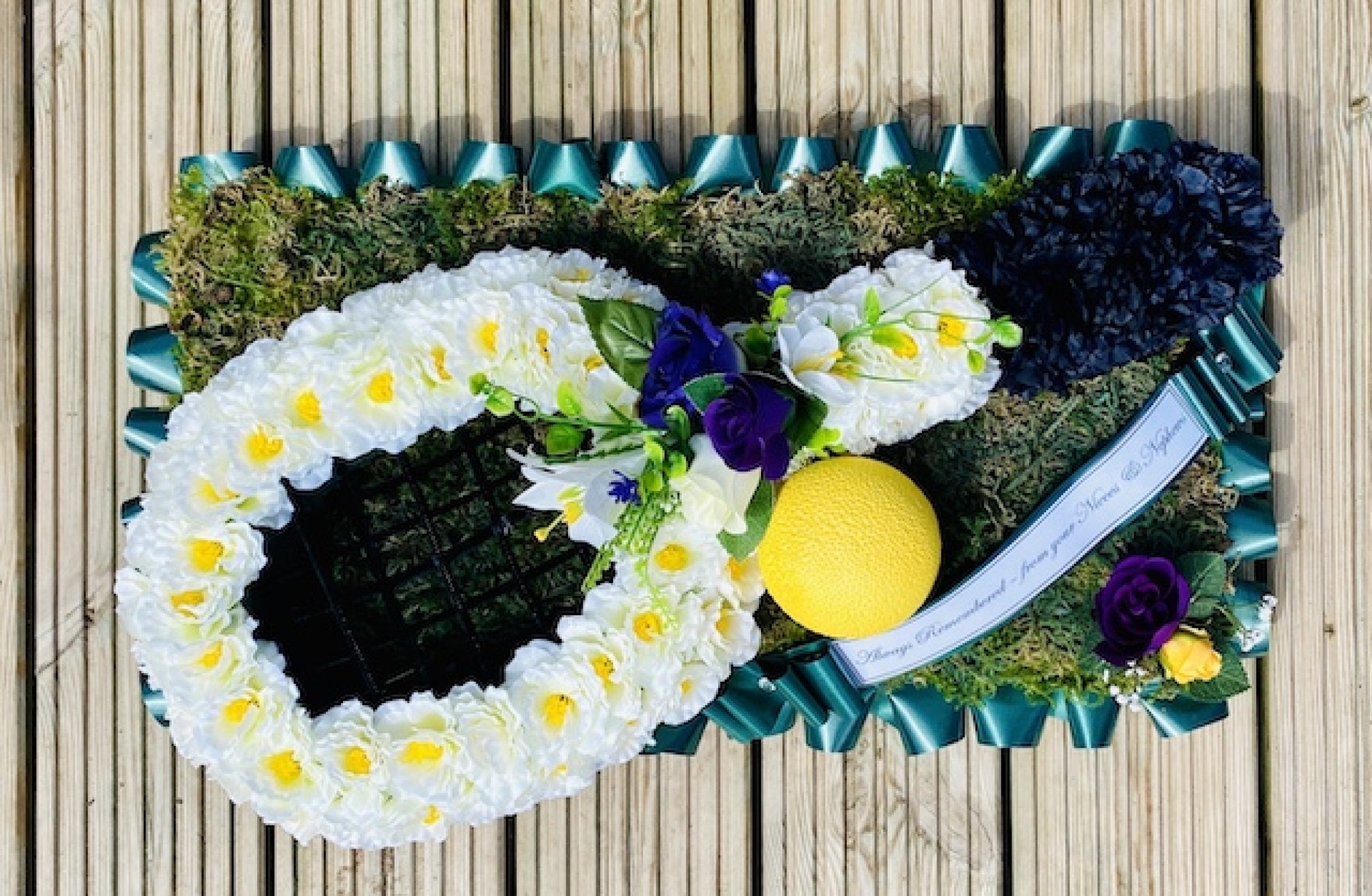 Tennis themed funeral tribute